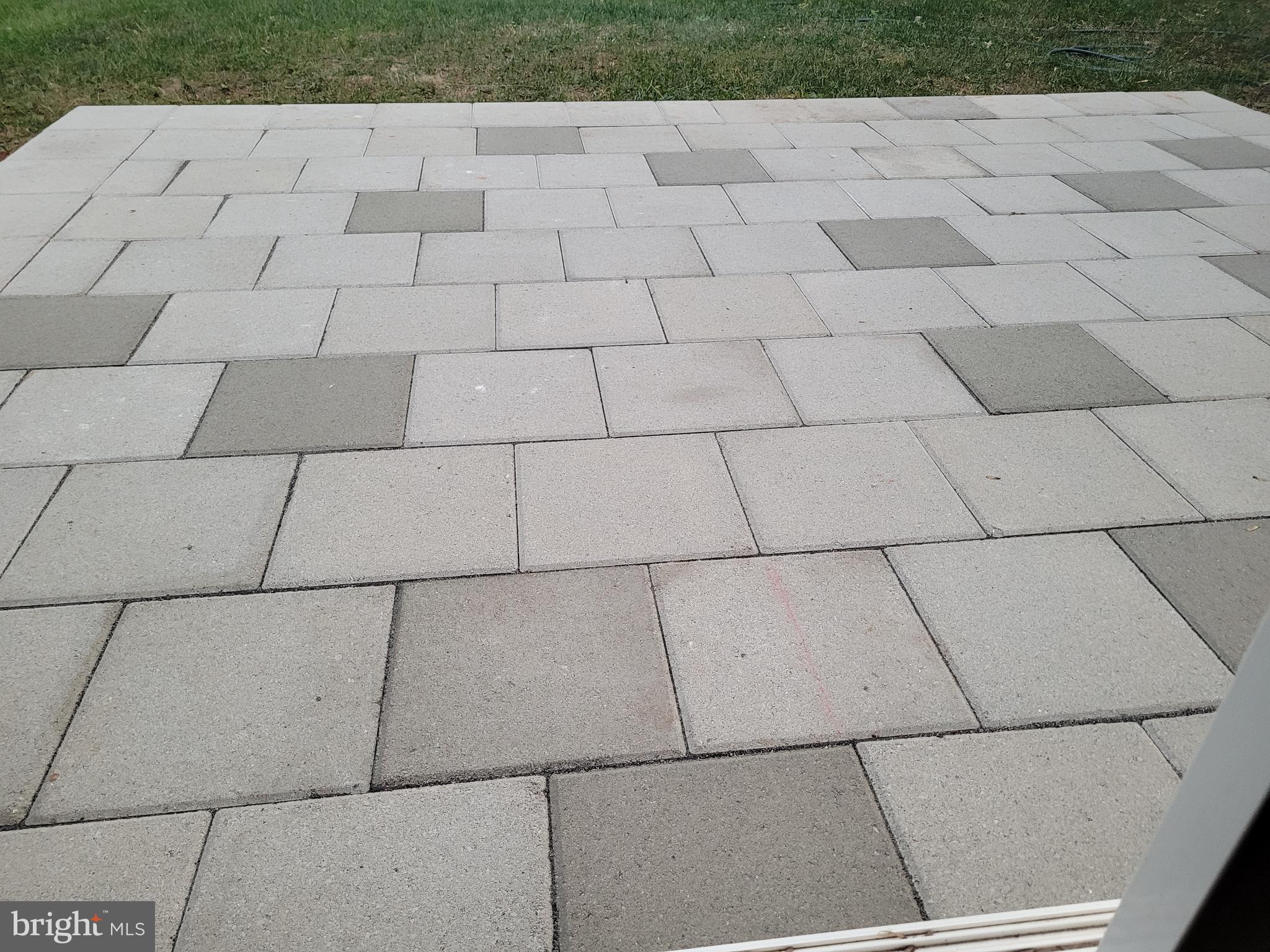 545 Winding Road Lansdale, PA 19446 - Photo 12 of 46 paver patio off of rear sliders.