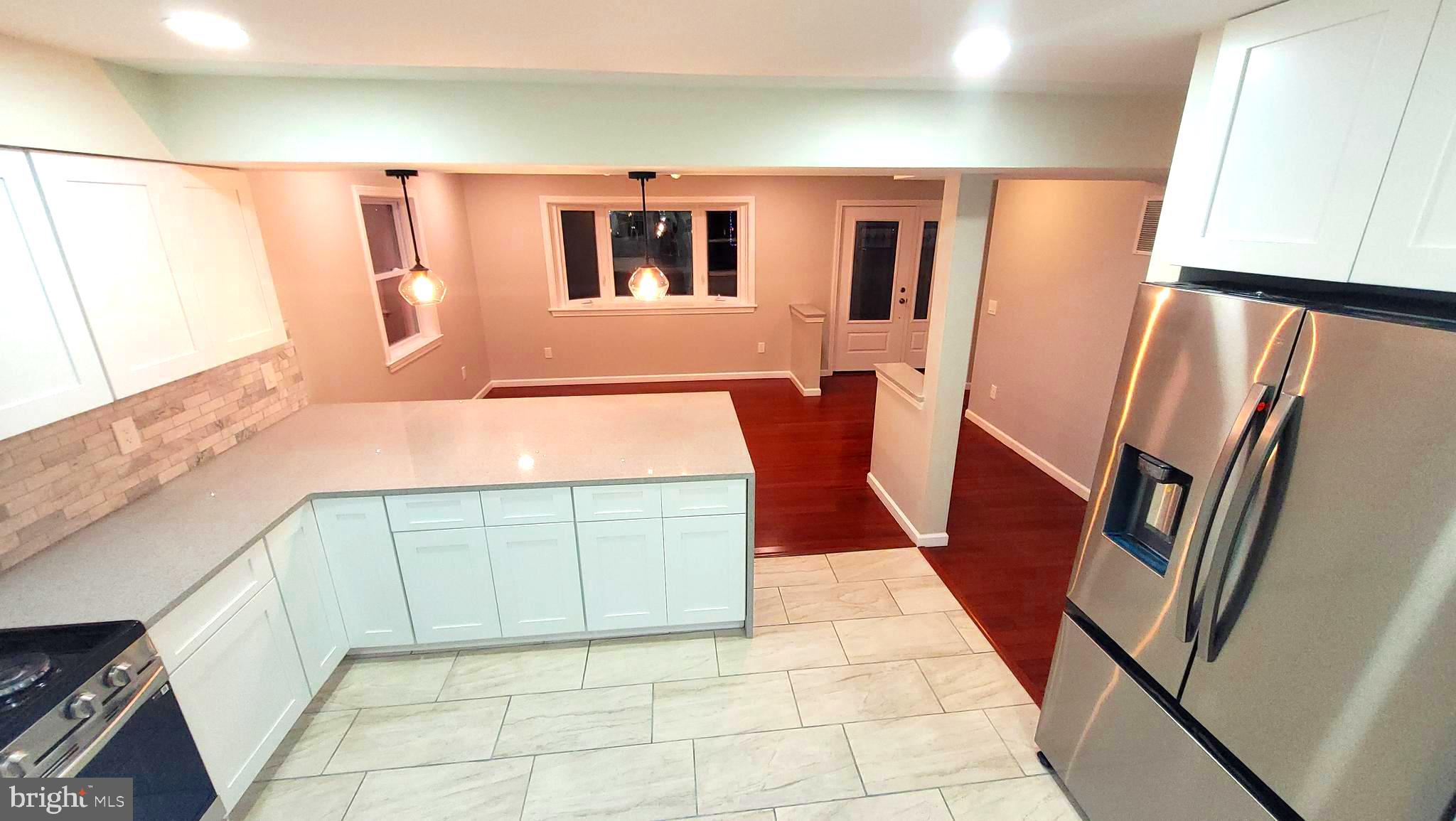 545 Winding Road Lansdale, PA 19446 - Photo 39 of 46 kitchen into dining room