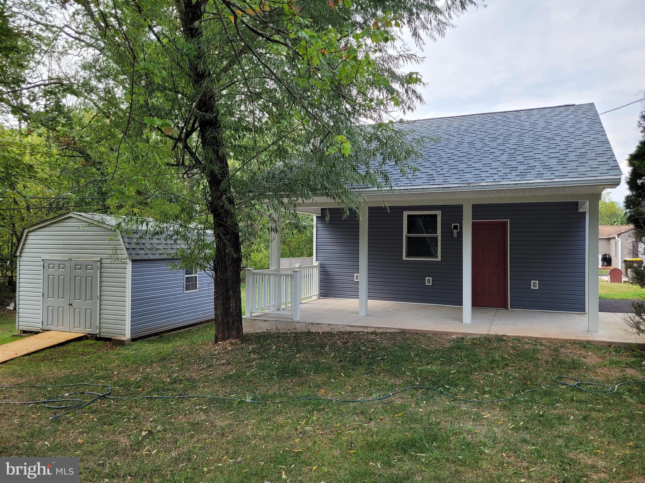 545 Winding Road Lansdale, PA 19446 - Photo 7 of 46 shed and covered porch off of garage