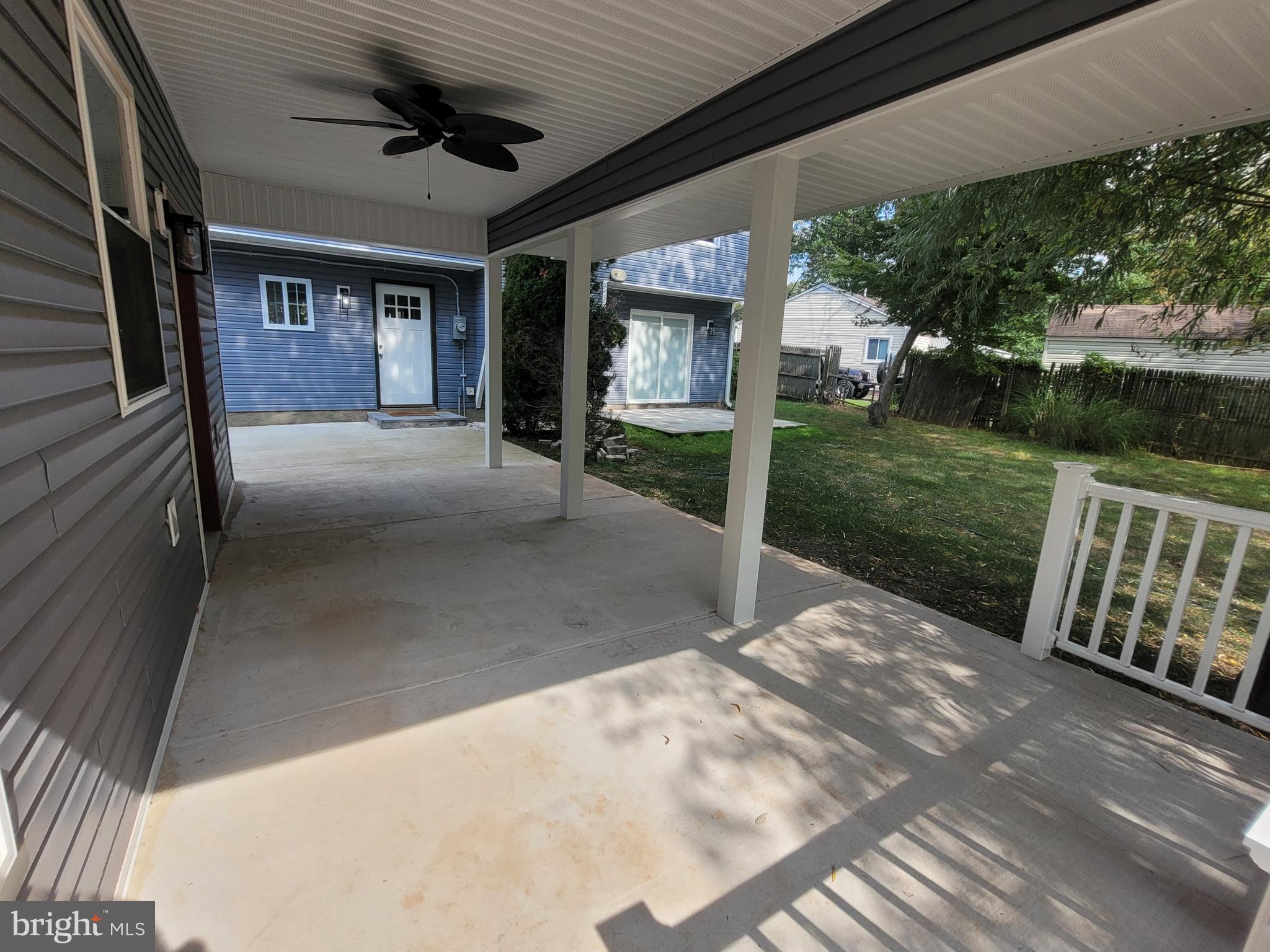 545 Winding Road Lansdale, PA 19446 - Photo 8 of 46 covered porch with fan