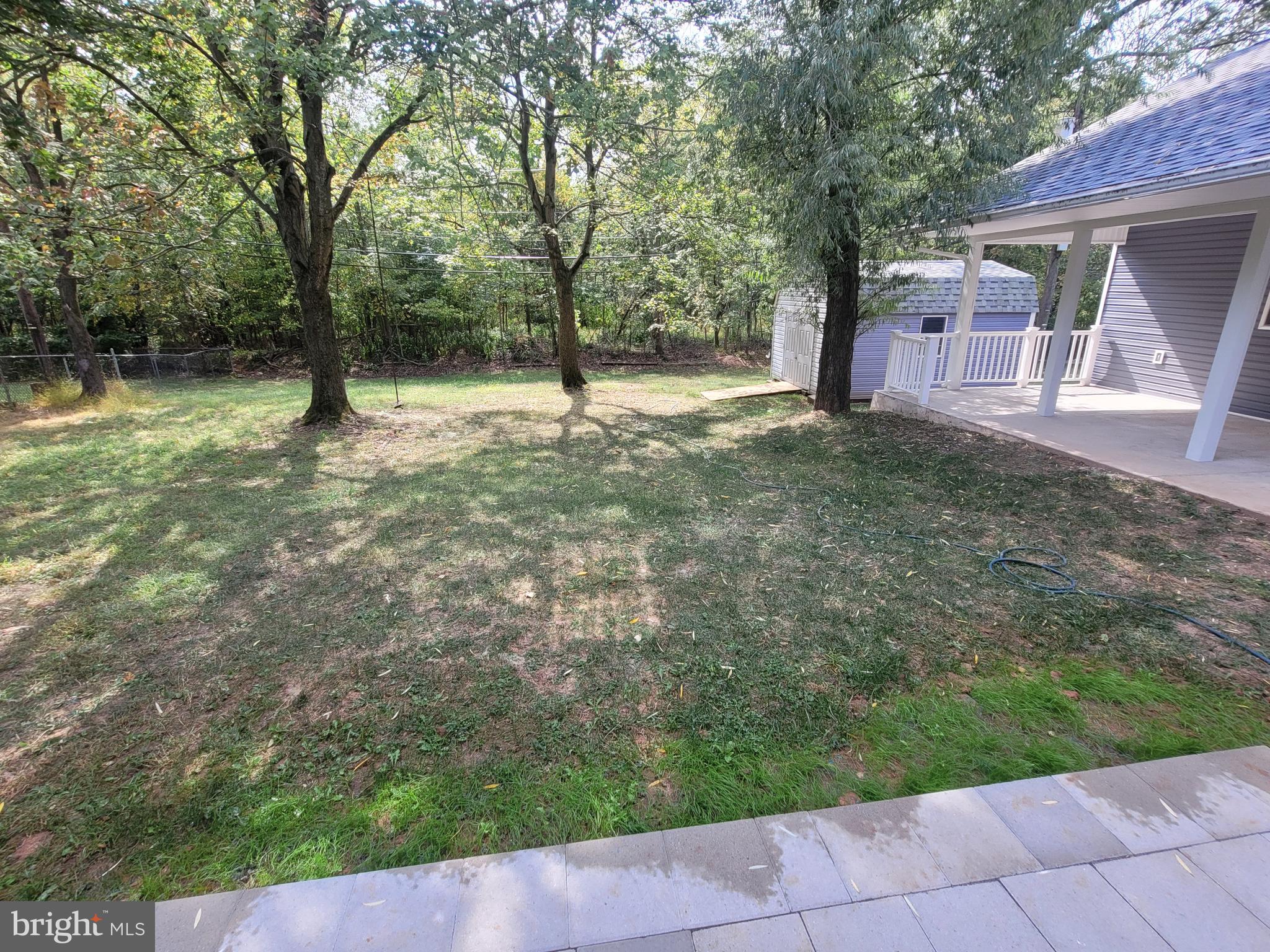 545 Winding Road Lansdale, PA 19446 - Photo 10 of 46 rear yard backs to wooded area