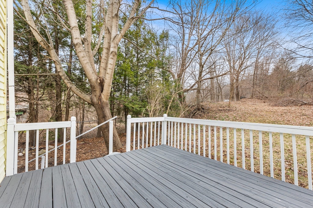 528 Walker Street Lenox, MA 01242 - Photo 12 of 13 a view of backyard with deck and wooden floor