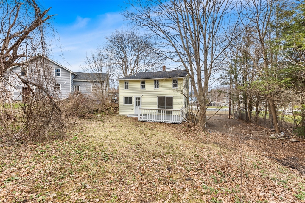 528 Walker Street Lenox, MA 01242 - Photo 10 of 13 a house with trees in front of it