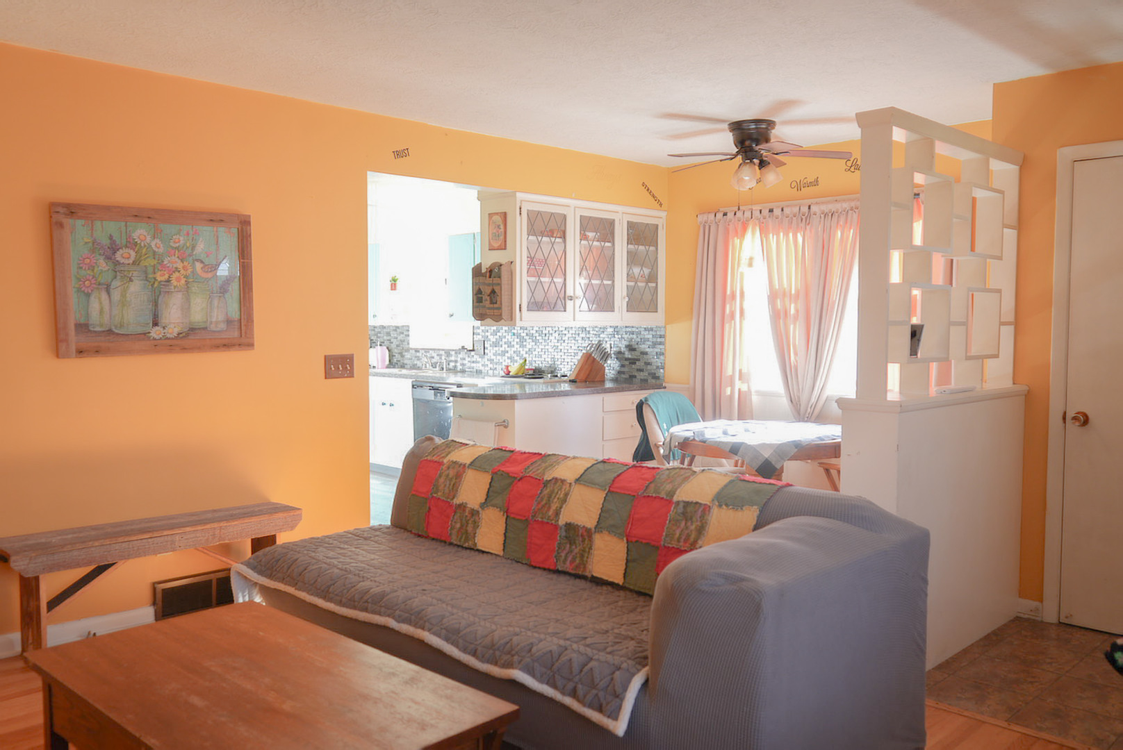 1843 31st Street Rock Island, IL 61201 - Photo 3 of 9 a living room with furniture and a large window