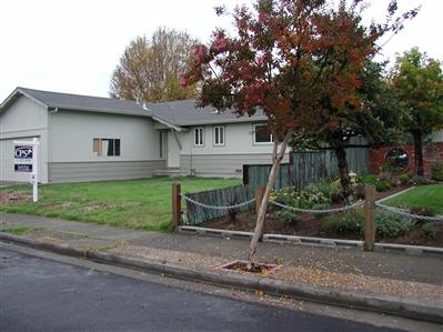 2627 Mohawk Street Santa Rosa, CA 95403 - Photo 11 of 12 a view of a house with a yard potted plants and a large tree