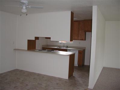 2627 Mohawk Street Santa Rosa, CA 95403 - Photo 2 of 12 a kitchen with a sink cabinets and a stove