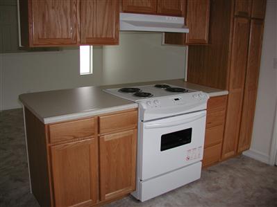 2627 Mohawk Street Santa Rosa, CA 95403 - Photo 3 of 12 a stove top oven sitting inside of a kitchen