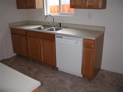 2627 Mohawk Street Santa Rosa, CA 95403 - Photo 4 of 12 a kitchen with a sink and cabinets