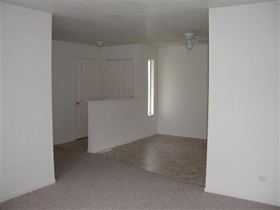 2627 Mohawk Street Santa Rosa, CA 95403 - Photo 5 of 12 an empty room with windows