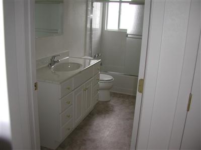 2627 Mohawk Street Santa Rosa, CA 95403 - Photo 7 of 12 a bathroom with a sink a toilet and a mirror