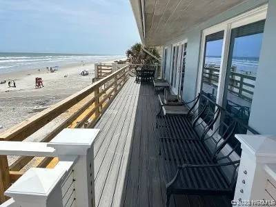 a view of balcony and kitchen