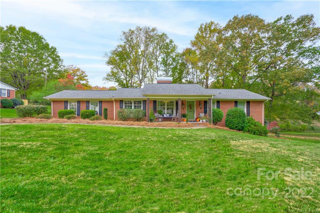 509 Roy Eaker Road Cherryville, NC 28021 - Photo 1 of 43 a front view of a house with yard patio and green space