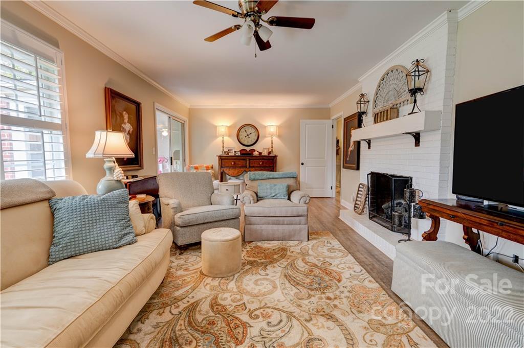 509 Roy Eaker Road Cherryville, NC 28021 - Photo 23 of 43 a living room with furniture and a flat screen tv