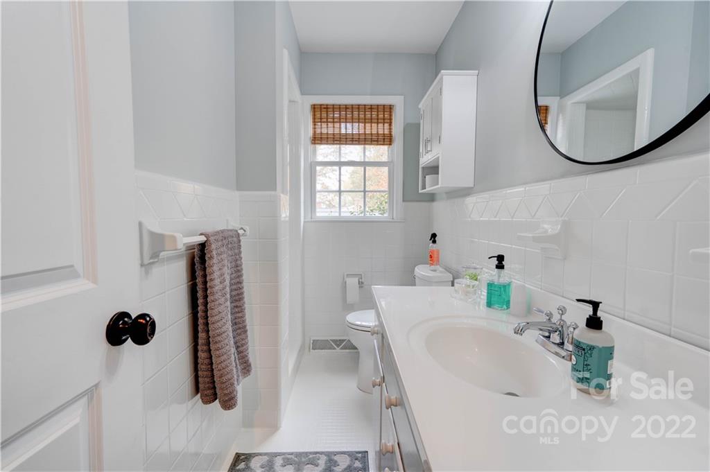 509 Roy Eaker Road Cherryville, NC 28021 - Photo 28 of 43 a bathroom with a sink and a mirror