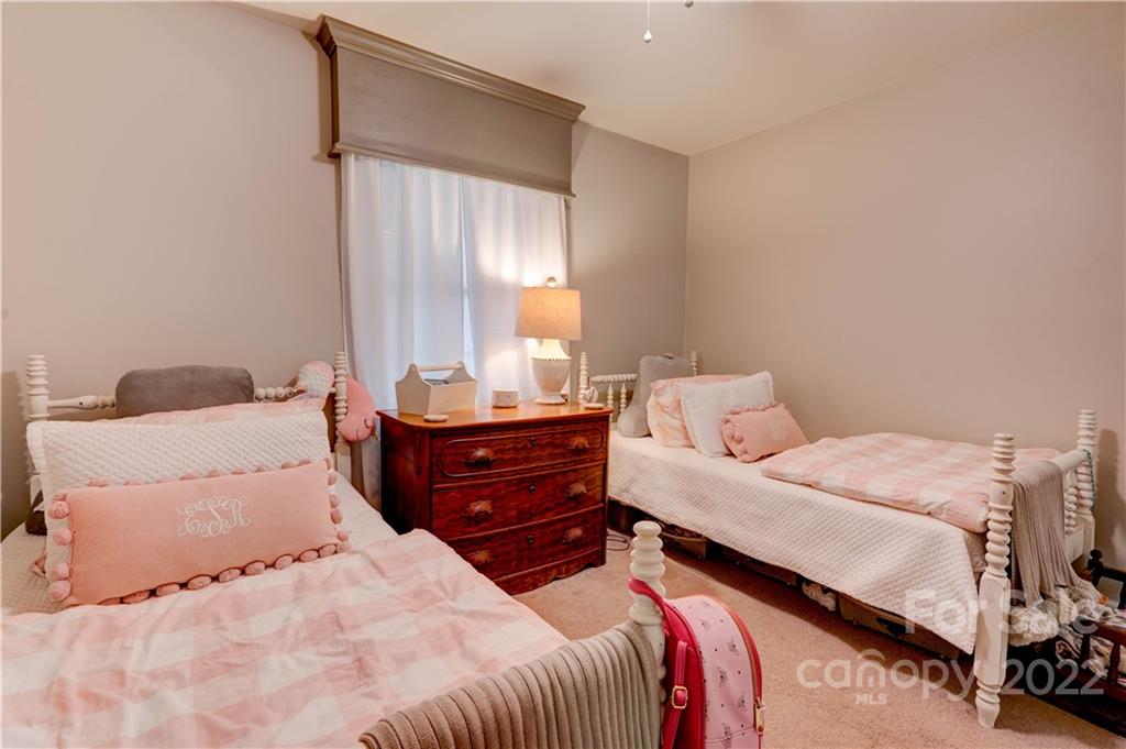 509 Roy Eaker Road Cherryville, NC 28021 - Photo 30 of 43 a bedroom with a bed and window
