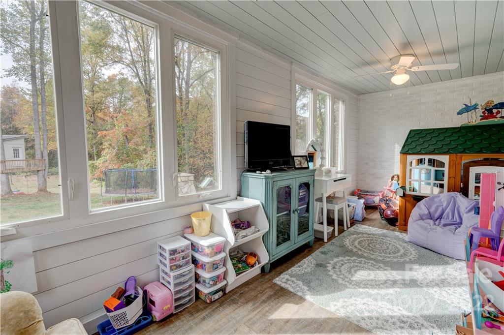509 Roy Eaker Road Cherryville, NC 28021 - Photo 35 of 43 a living room with furniture and a flat screen tv
