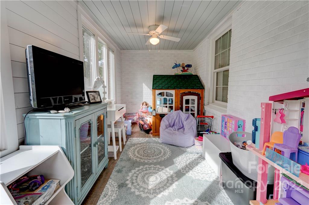 509 Roy Eaker Road Cherryville, NC 28021 - Photo 36 of 43 a living room with furniture and a flat screen tv
