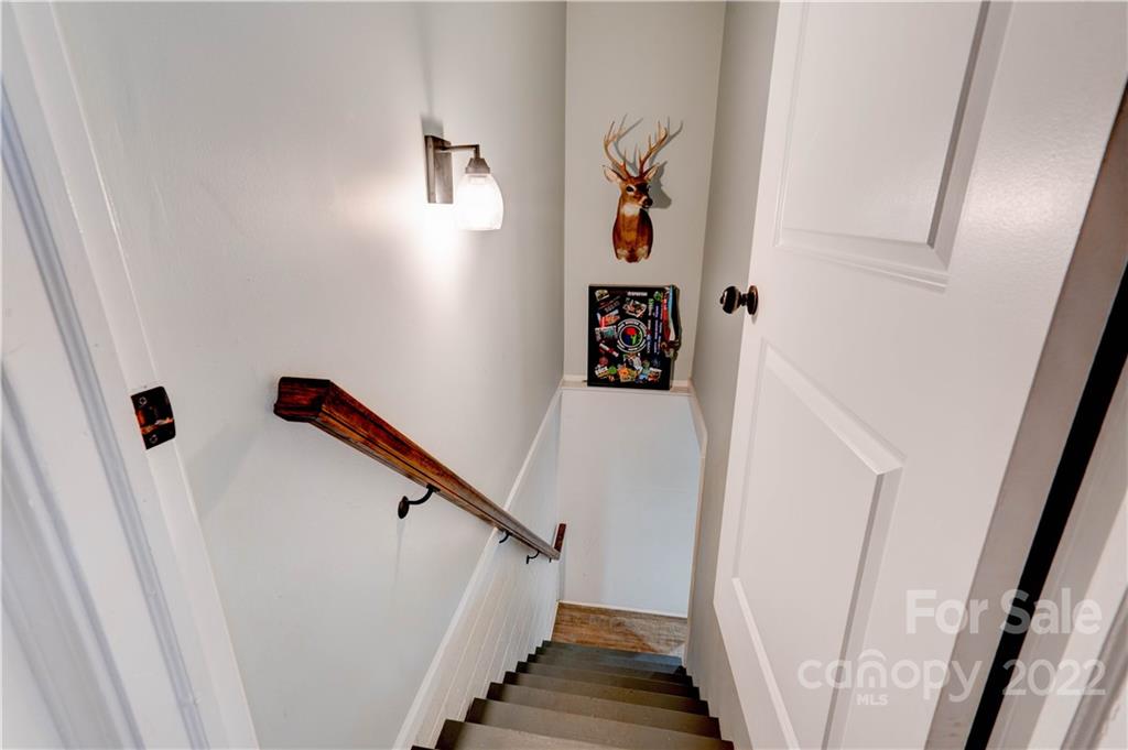 509 Roy Eaker Road Cherryville, NC 28021 - Photo 38 of 43 a view of entryway with hallway and stairs