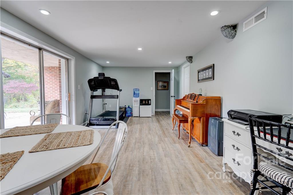 509 Roy Eaker Road Cherryville, NC 28021 - Photo 40 of 43 a living room with furniture and a wooden floor