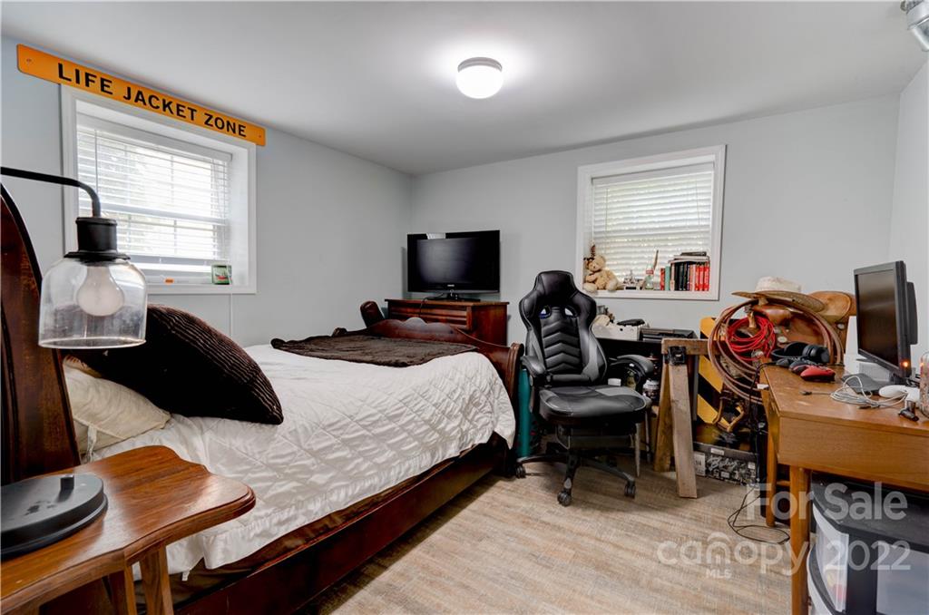 509 Roy Eaker Road Cherryville, NC 28021 - Photo 43 of 43 a bedroom with a bed a chair and a window
