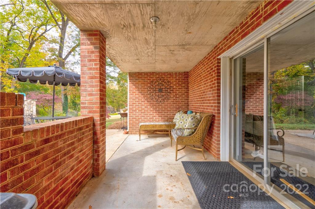 509 Roy Eaker Road Cherryville, NC 28021 - Photo 9 of 43 a balcony with chairs and outdoor views