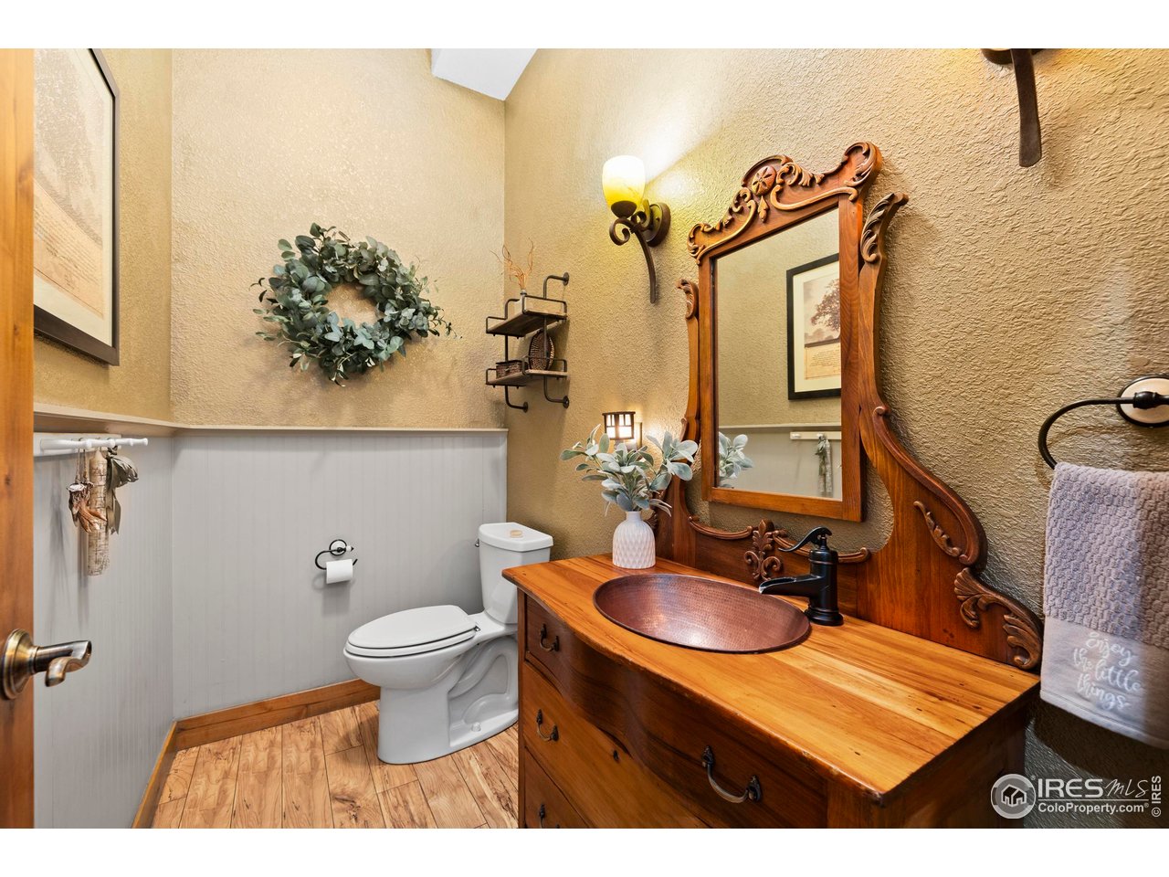 952 Skinner Gulch Road Loveland, CO 80537 - Photo 14 of 43 Main Floor Powder Bathroom