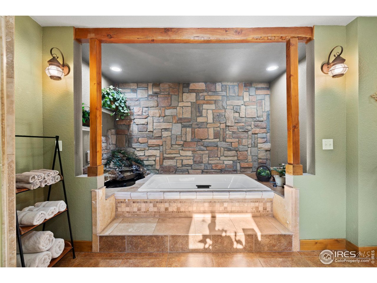 952 Skinner Gulch Road Loveland, CO 80537 - Photo 20 of 43 Cozy Bathtub with Water Feature