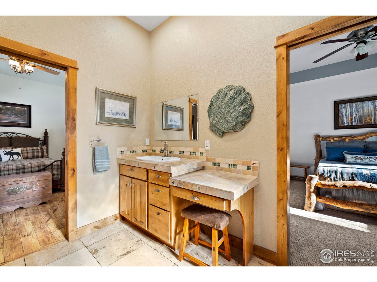 952 Skinner Gulch Road Loveland, CO 80537 - Photo 27 of 43 Main Floor Full Jack-and-Jill Bathroom