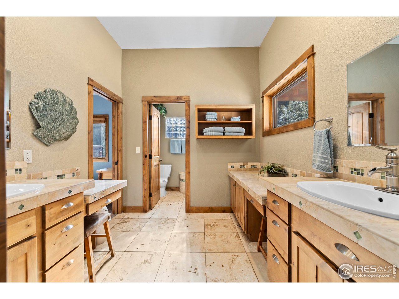 952 Skinner Gulch Road Loveland, CO 80537 - Photo 28 of 43 Main Floor Full Jack-and-Jill Bathroom