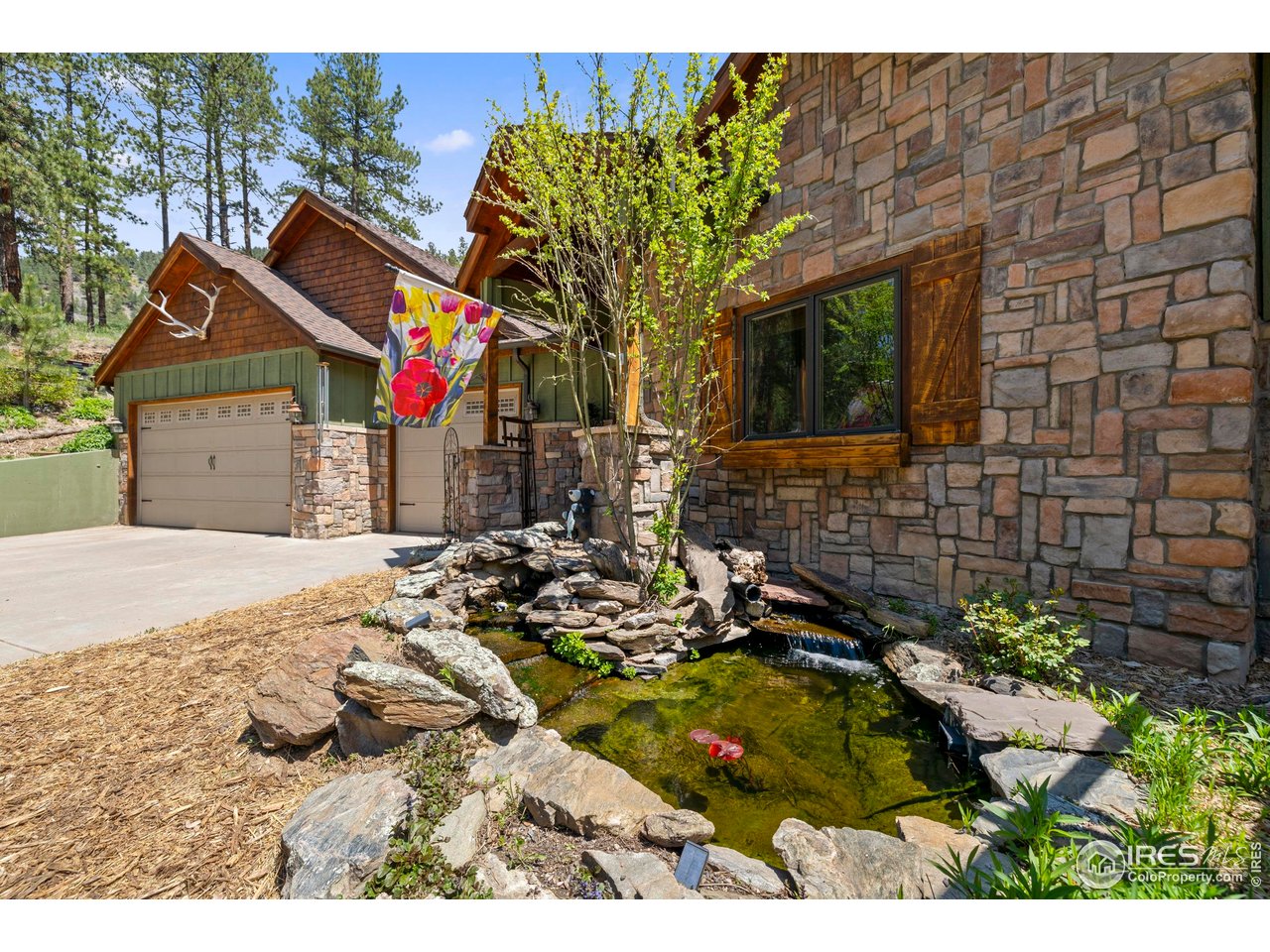 952 Skinner Gulch Road Loveland, CO 80537 - Photo 7 of 43 Front Entry Water Feature