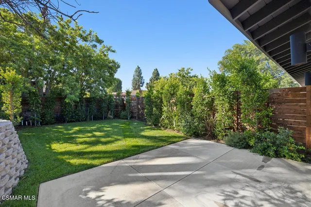 a view of a backyard with a garden
