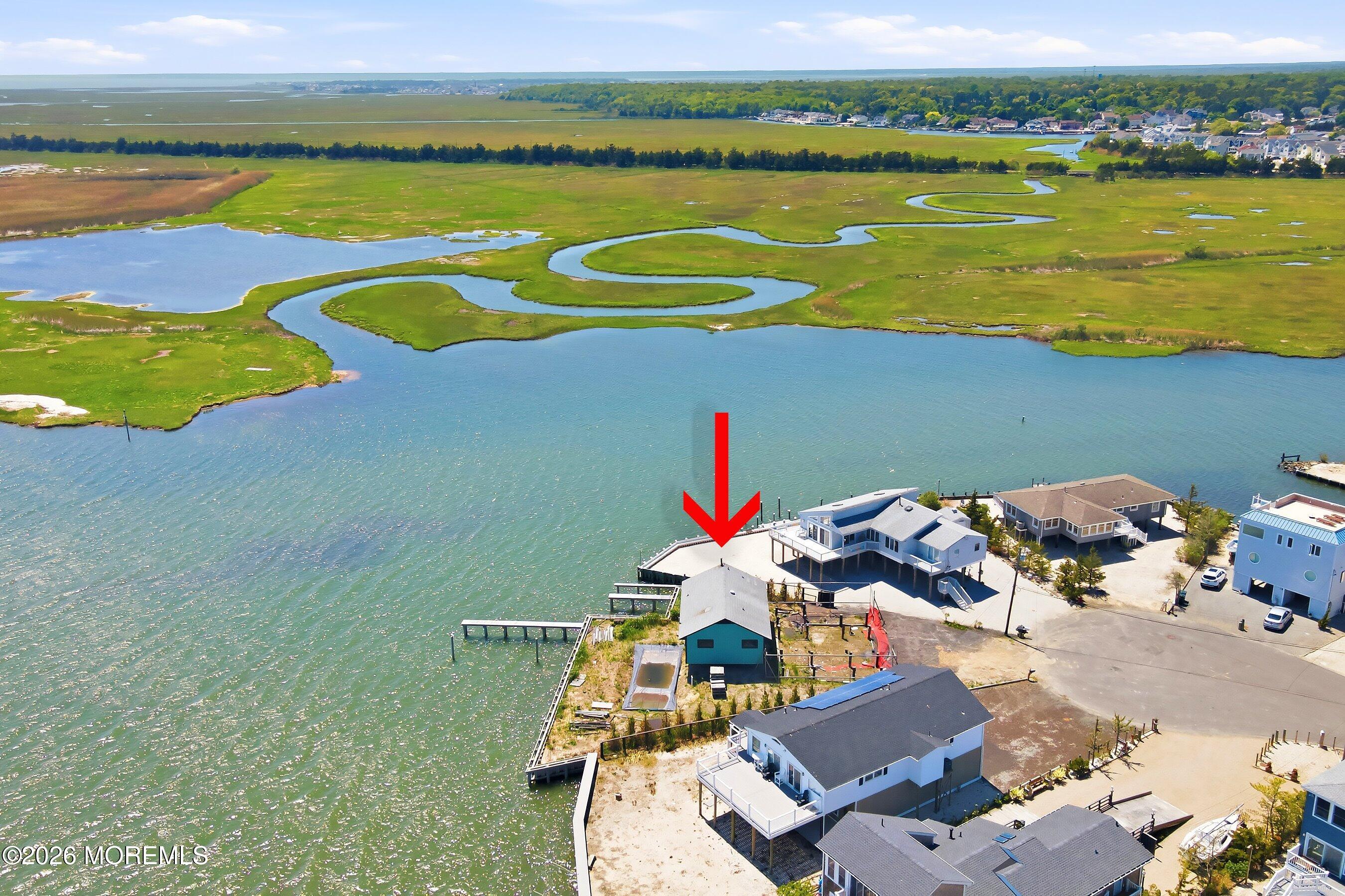 48 Parker Road Tuckerton, NJ 08087 - Photo 26 of 35 swimming pool view with lake view and a floor to ceiling window