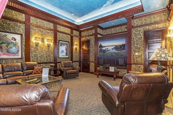 a view of living room filled with furniture and window