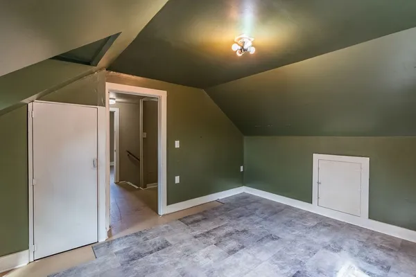 front view of a house with a small yard