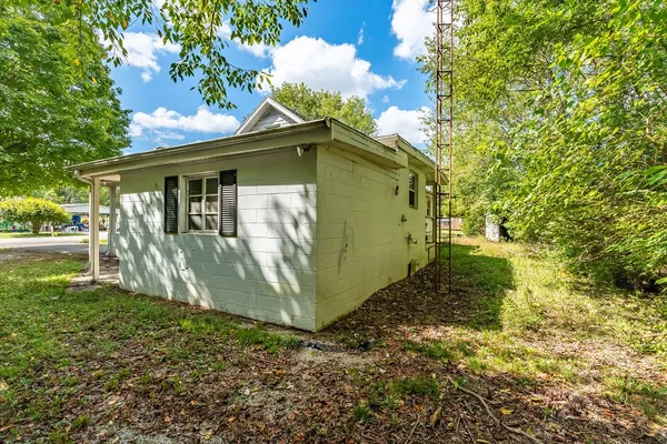 a backyard of a house with garden
