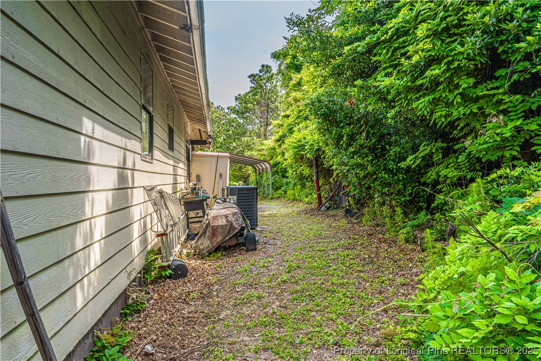 8212 Main Street West End, NC 27376 - Photo 13 of 36 a view of a backyard