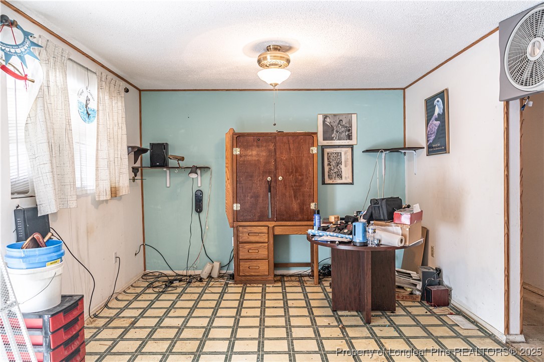 8212 Main Street West End, NC 27376 - Photo 21 of 36 a room with furniture and a rug