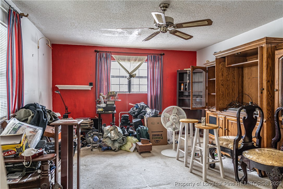 8212 Main Street West End, NC 27376 - Photo 25 of 36 a room with musical instruments