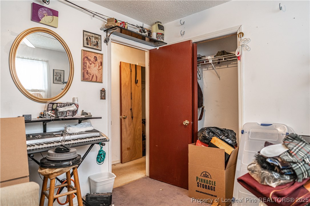 8212 Main Street West End, NC 27376 - Photo 28 of 36 wooden floor and utility room with a window