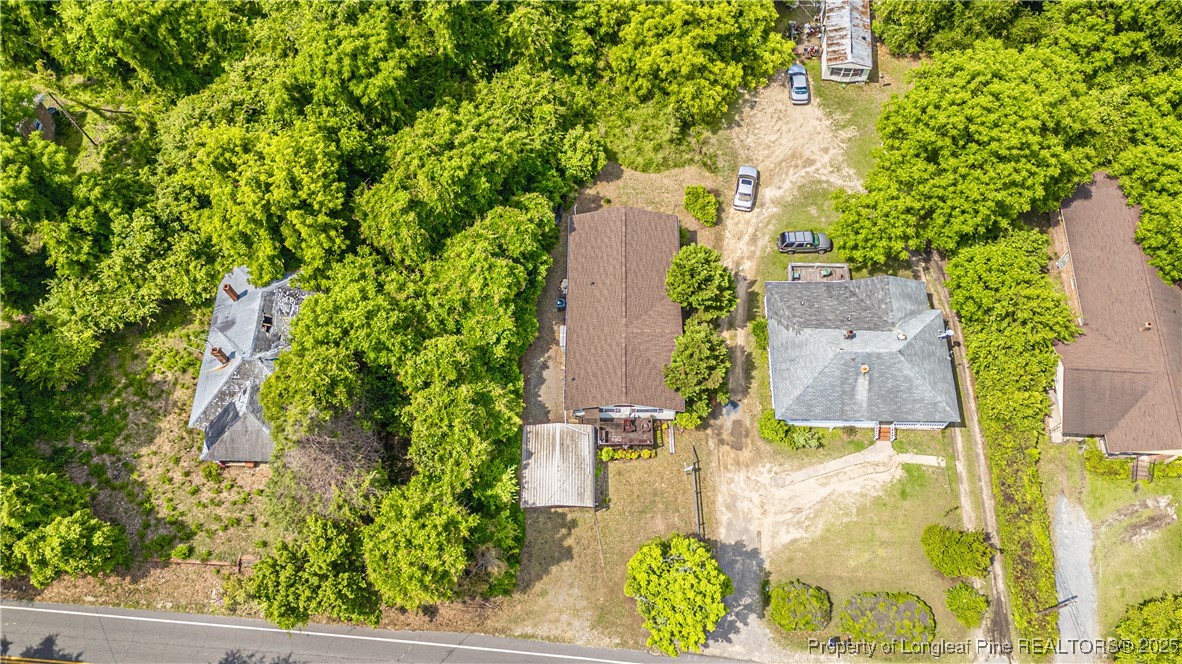 8212 Main Street West End, NC 27376 - Photo 6 of 36 an aerial view of residential house with outdoor space and trees all around