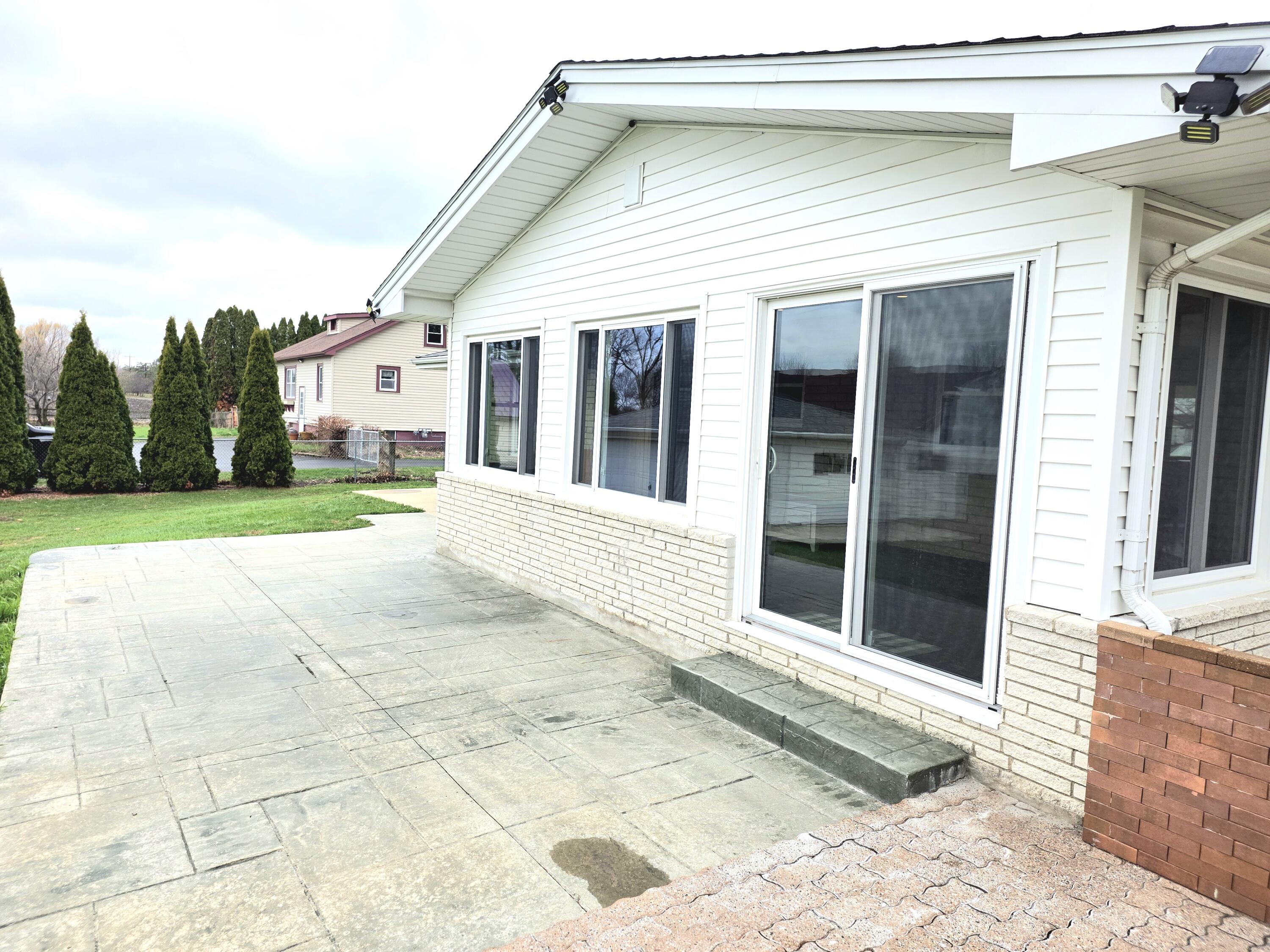 10741 Spring Street Mount Pleasant, WI 53177 - Photo 22 of 48 Stamped Concrete Patio