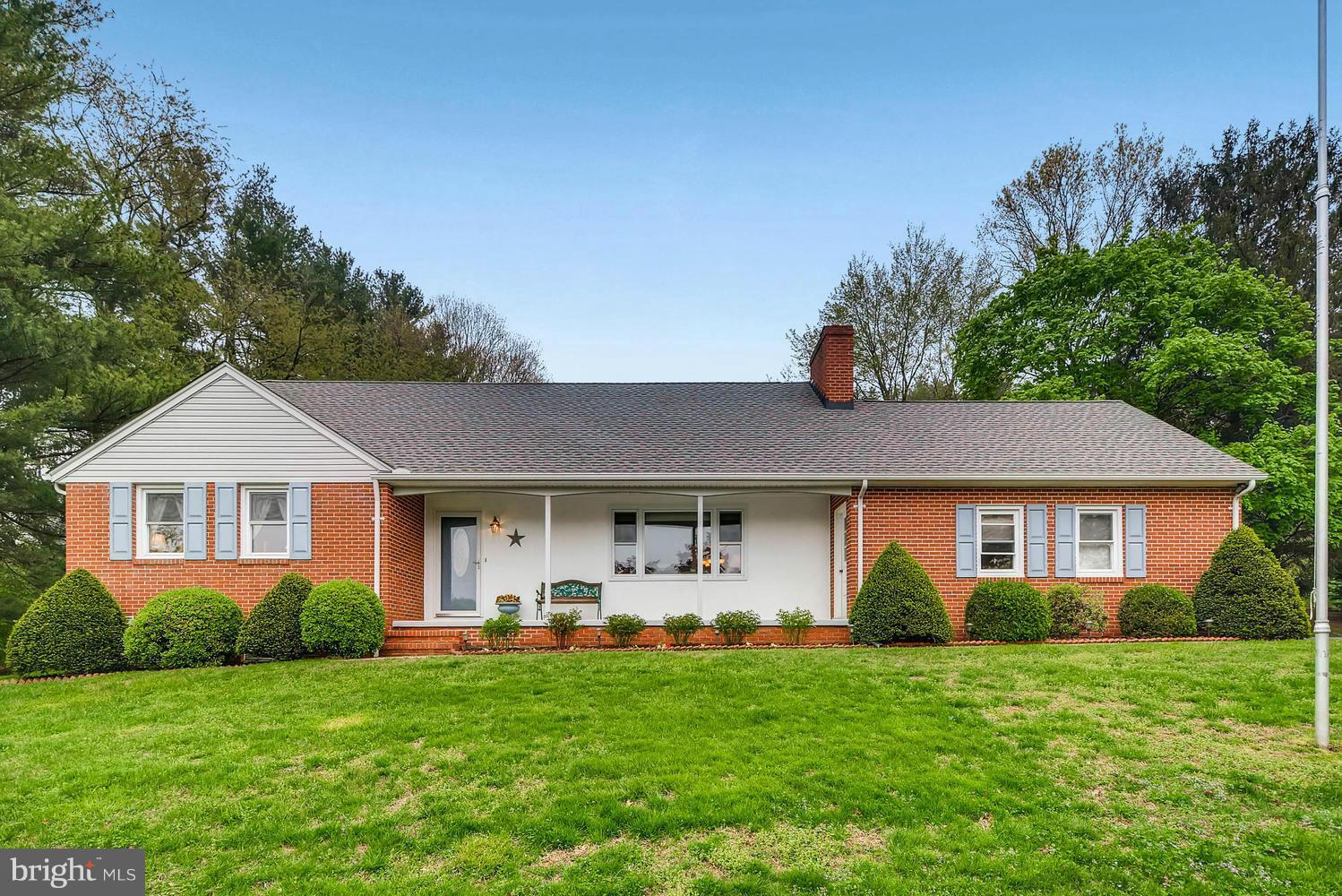 2705 Lawson Road Fallston, MD 21047 - Photo 1 of 30 a front view of a house with a garden