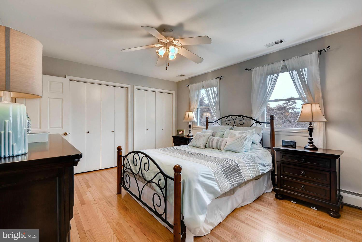 2705 Lawson Road Fallston, MD 21047 - Photo 15 of 30 a bedroom with a bed and a chandelier