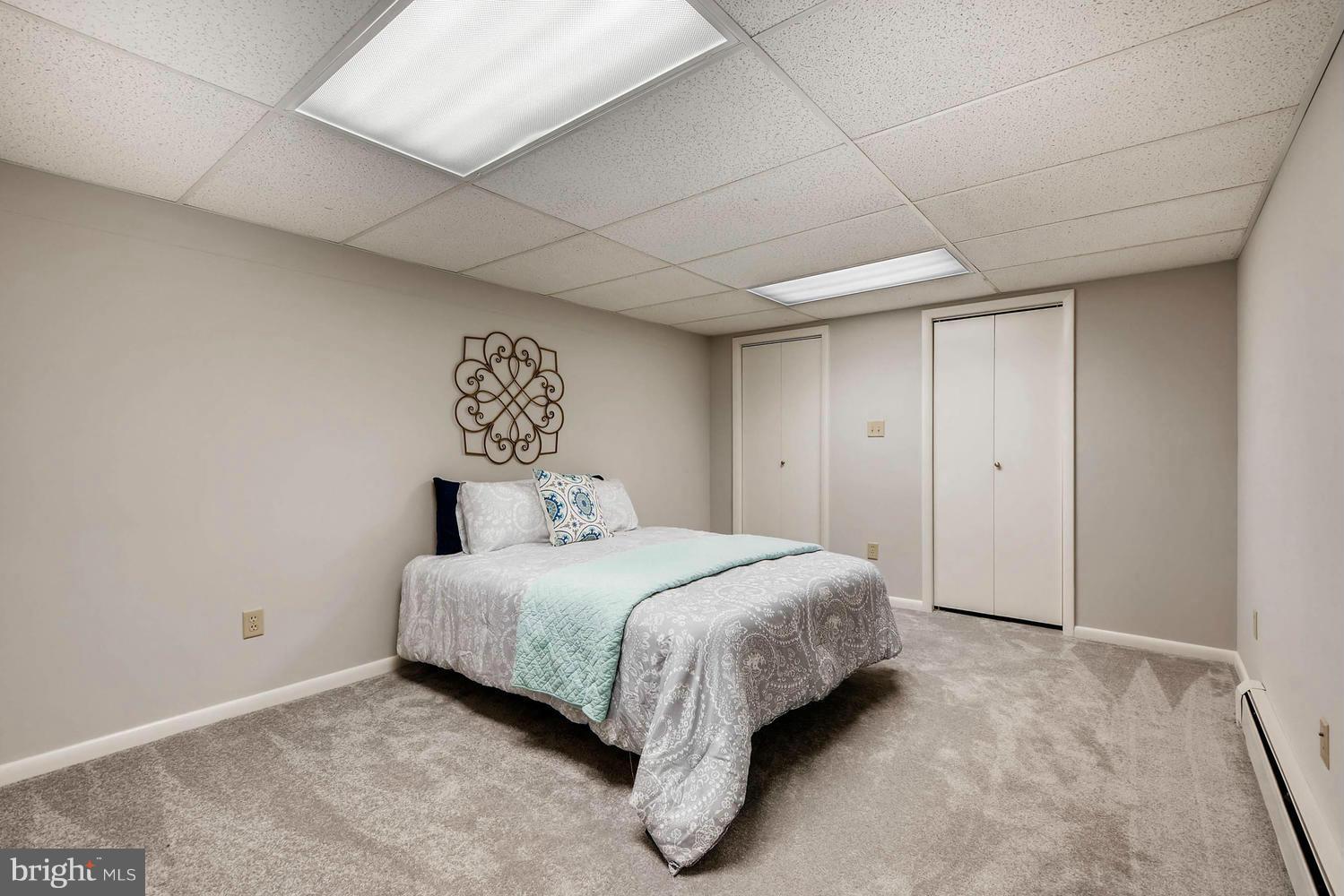 2705 Lawson Road Fallston, MD 21047 - Photo 23 of 30 a bedroom with a bed and painting on the wall