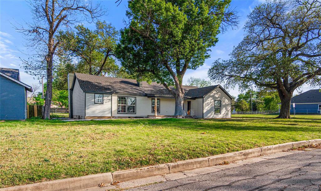 2928 Pine Avenue Waco, TX 76708 - Photo 24 of 24 a house that has a big yard with large trees