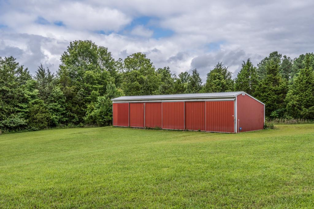 9794 Missionary Ridge Road Bon Aqua, TN 37025 - Photo 23 of 30 a view of yard with green space and wooden fence