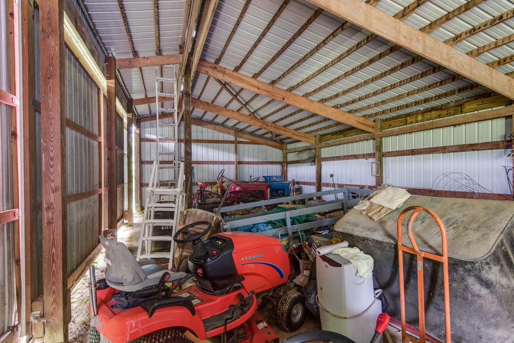 9794 Missionary Ridge Road Bon Aqua, TN 37025 - Photo 24 of 30 a view of a room with gym equipment
