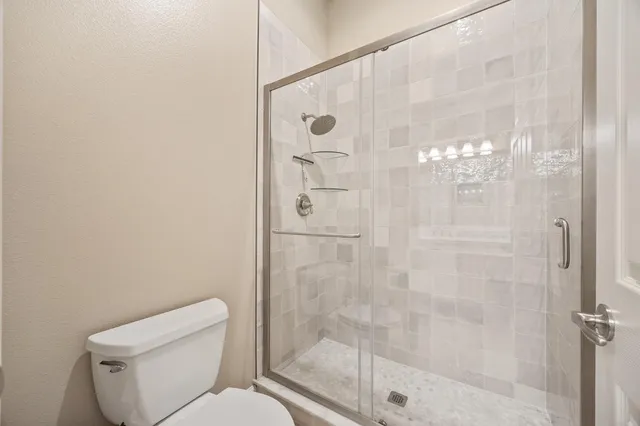 a view of a room with a table and chair