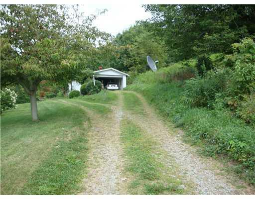 1182 Pleasant Valley Road Mount Pleasant, PA 15666 - Photo 3 of 6 Parking Lot/Garage. Large enough for 5 - 6 cars Tandom Style