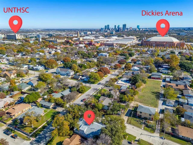 an aerial view of a city with lots of residential buildings